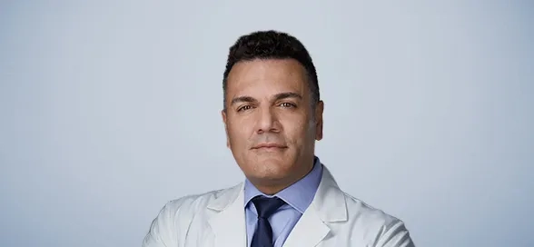 Dr. Kam Kassiri